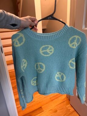Girl’s Aqua Crewneck Sweater with Yellow Peace Sign Pattern